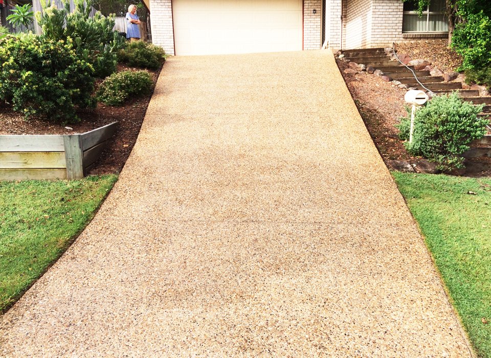 Residential driveway after professional pressure cleaning