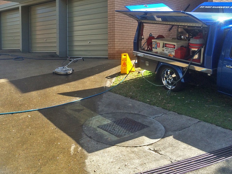 Driveway area at a body corporate being professionally pressure cleaned