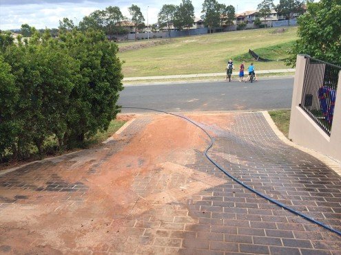 Brisbane residential driveway being professionally cleaned
