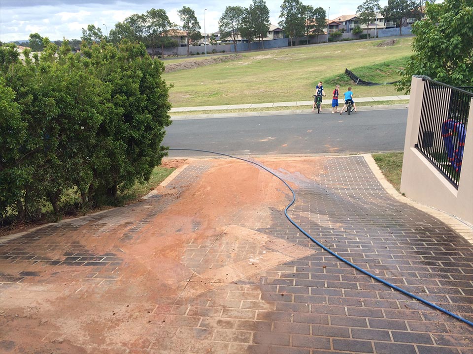 Brisbane residential driveway being professionally cleaned