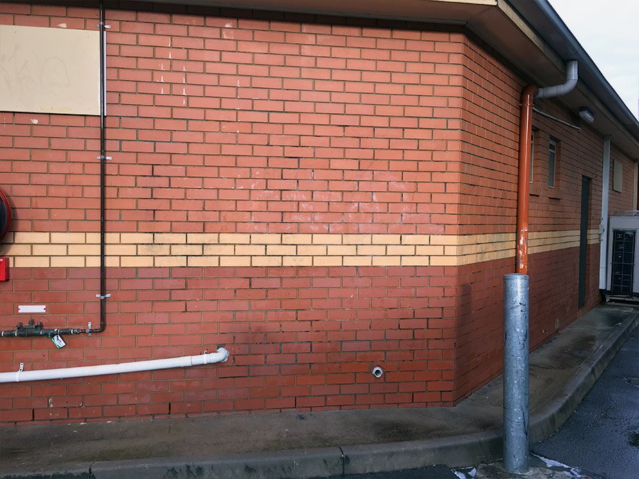 Brick wall after professional graffiti removal